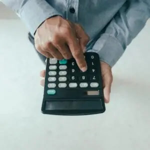 Med Student Using A Calculator